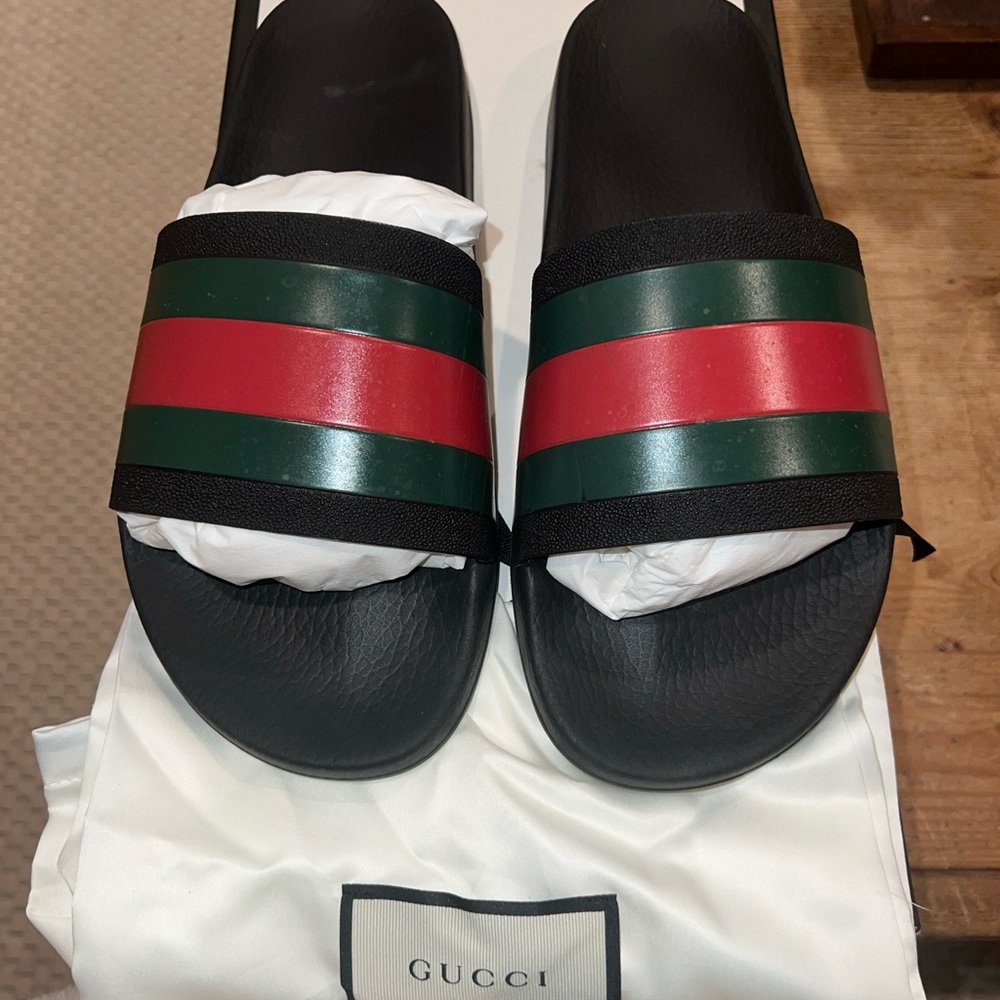 Authentic Gucci Men's Black and Green Slide Sandals purchased from Saks